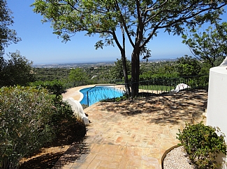 pool viewed from the side of the villa