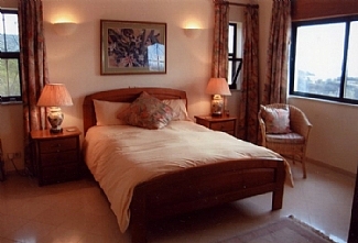 Upstairs en -suite bedroom with adjoining lounge